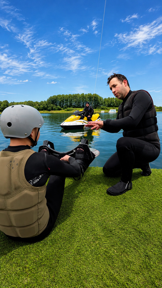 Flyboarding instructor and jetski on the side of the lake at north Yorkshire water park